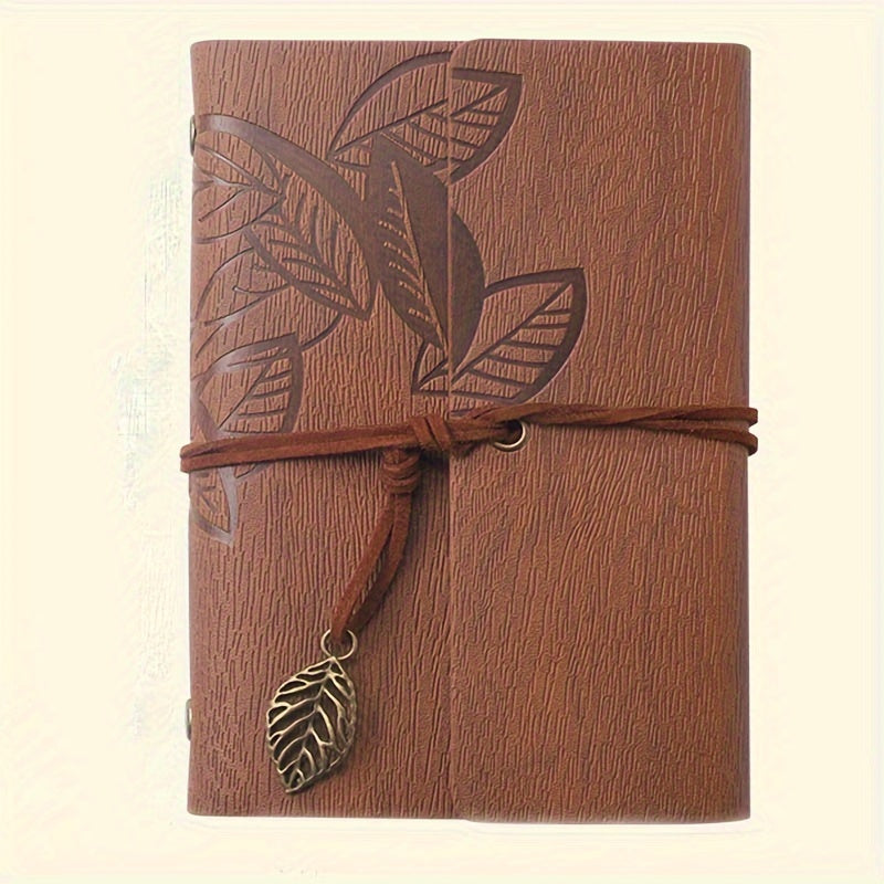 Vintage spiral-bound faux leather notebook with leaf-embossed design and strap closure, available in black, orange, and blue, perfect for students and travelers.