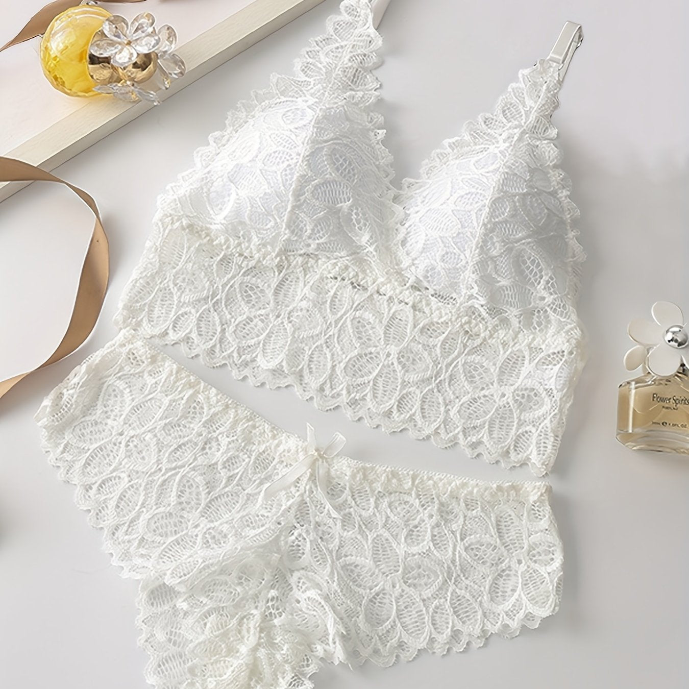 French lace vest-style summer underwear suit with thin mould cup for breathability and comfort.