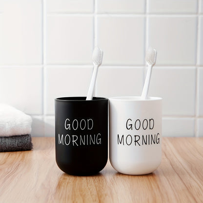 Durable plastic toothbrush holder for couples with creative design.