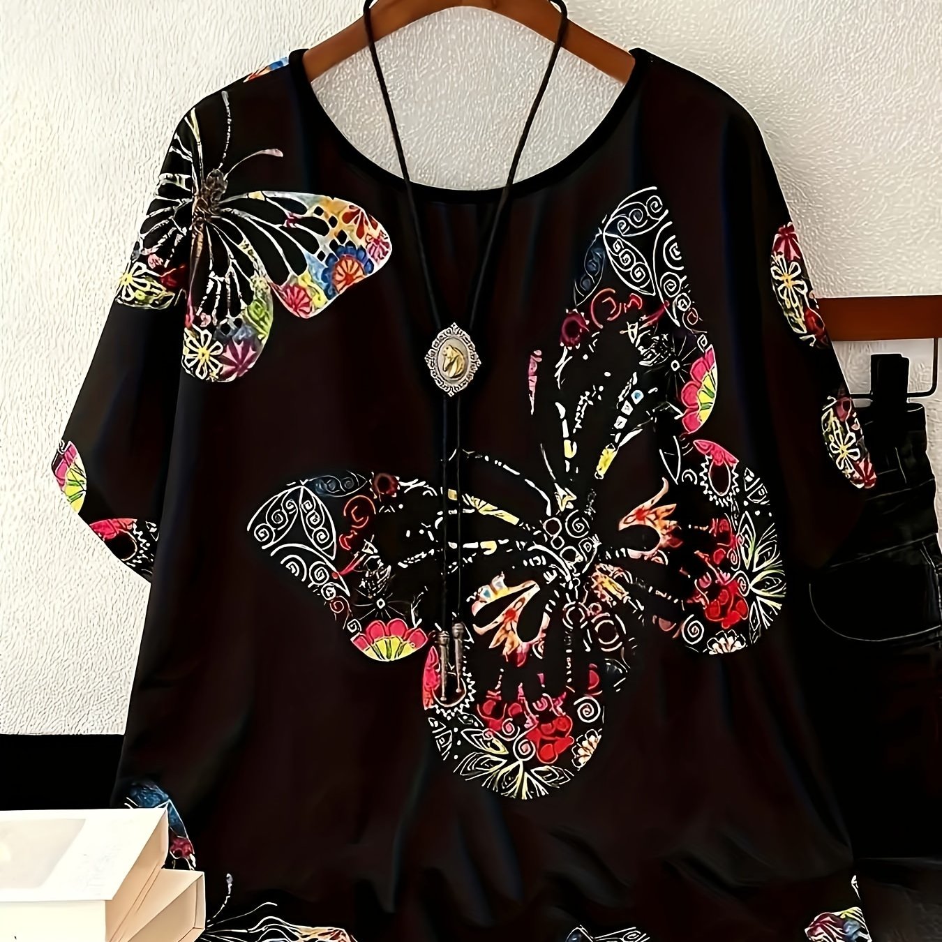 Butterfly print T-shirt for plus size women, crew neck style.