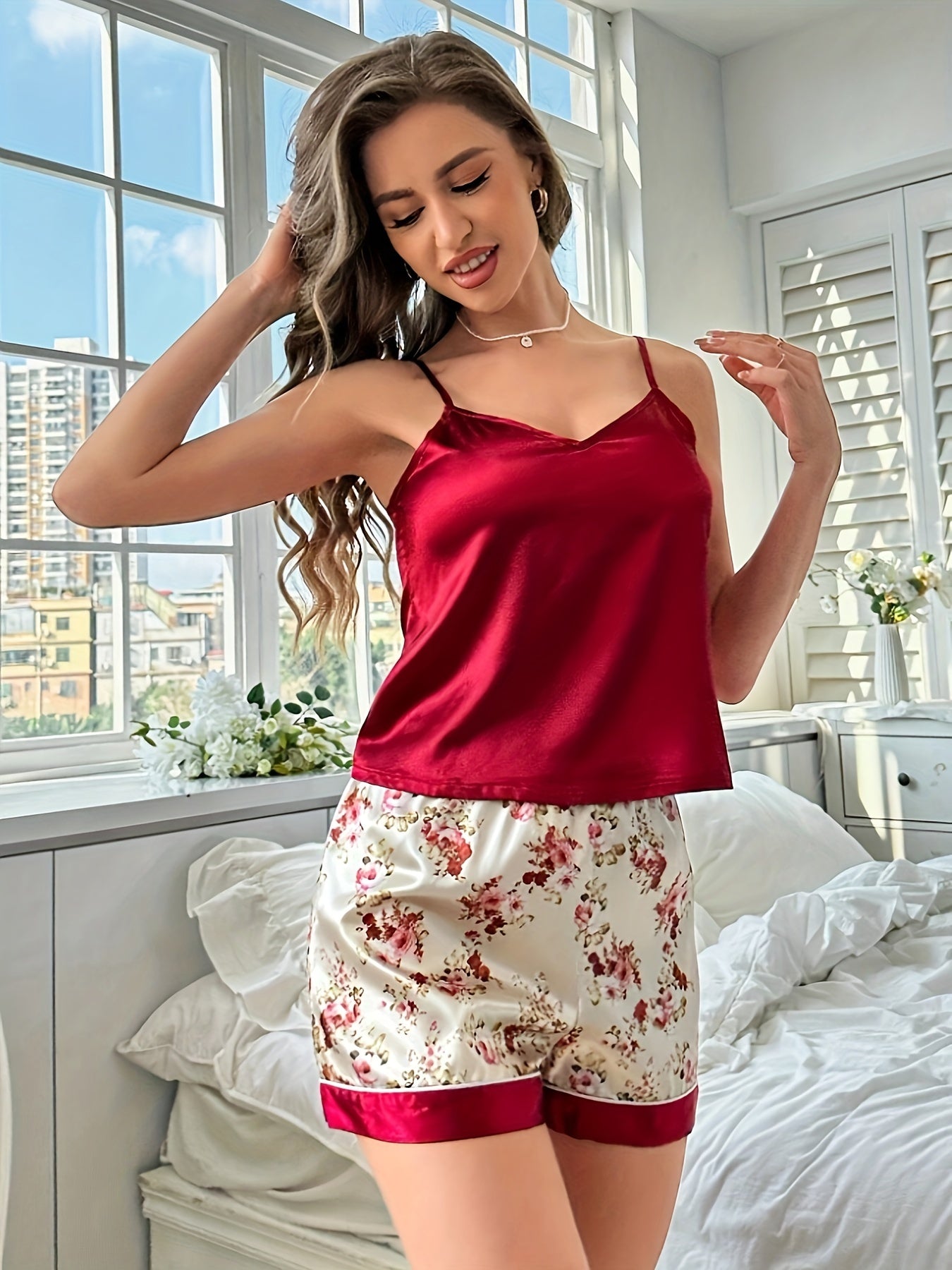 Polyester blend pajama set with V-neck cami top and shorts, can be machine washed.