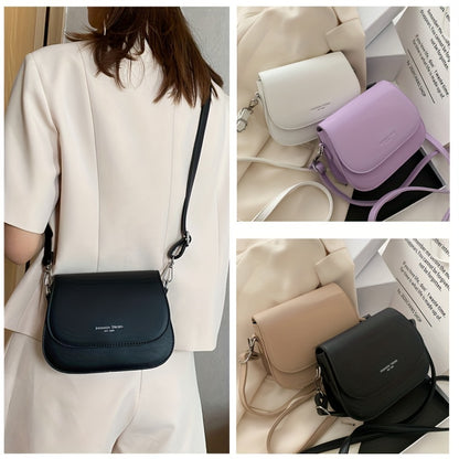 New trendy solid color crossbody bag for women, simple and fashionable shoulder saddle bag.