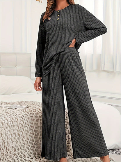 Women's casual suit with ribbed knit top and matching hooded wide-leg pants.