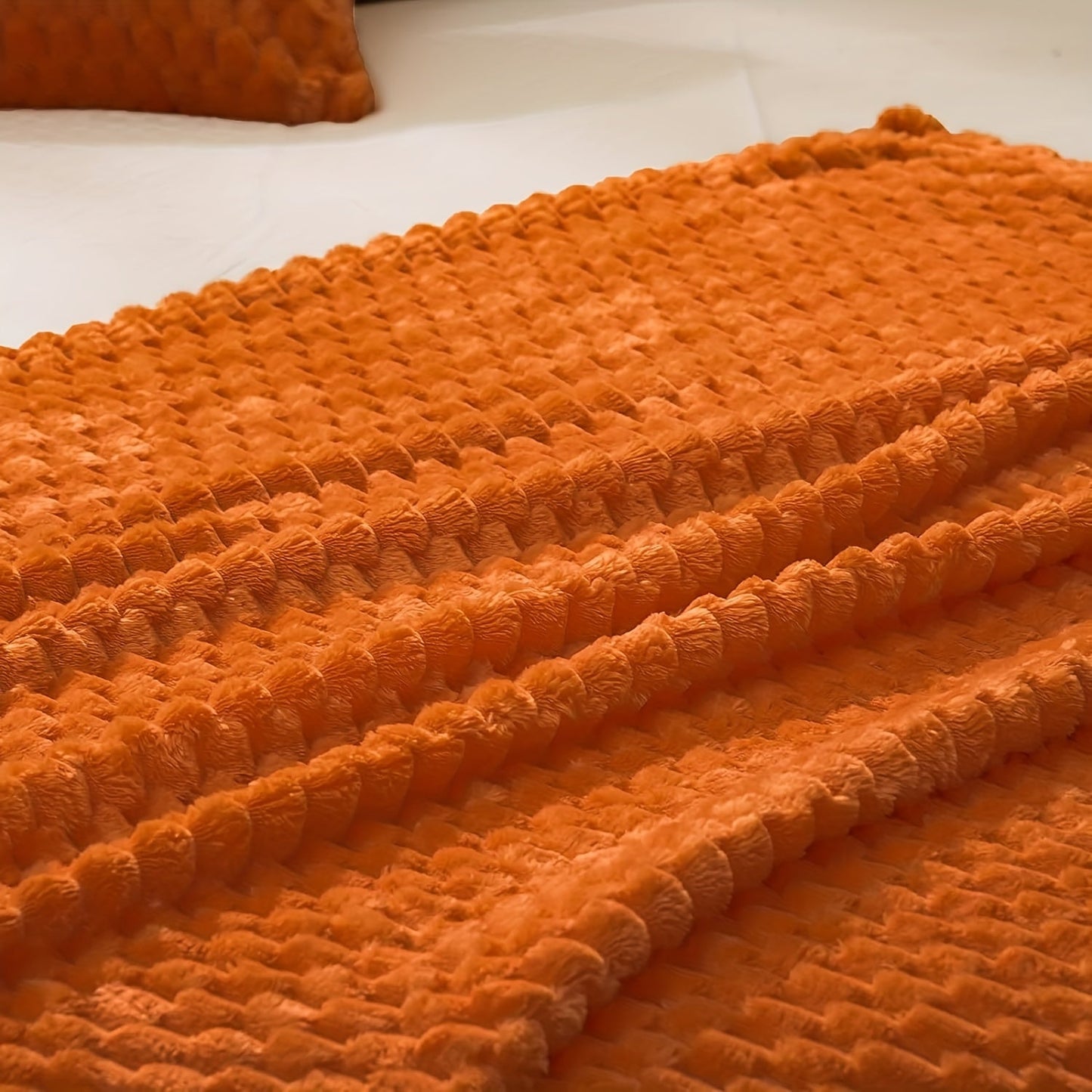 Cozy up with our luxurious Burnt Orange Flannel Throw Blanket, crafted with ultra-soft 3D Jacquard for the ultimate warmth and comfort on your couch, sofa, bed, or chair. This all-season blanket is tear-resistant and lightweight, providing you with the