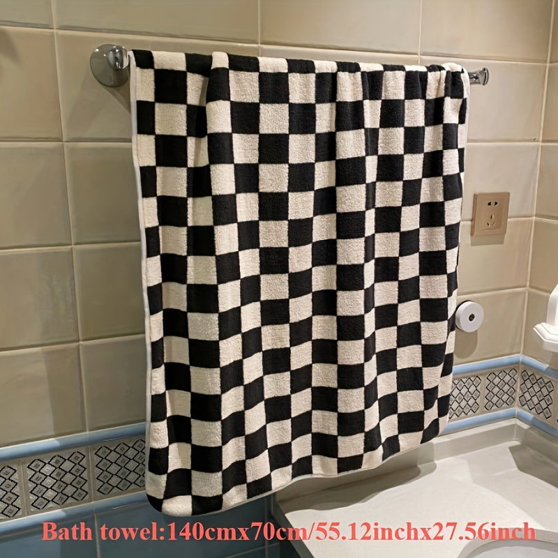 Soft skin face towel in checkerboard pattern, absorbent and comfortable for bathroom, gym, and kitchen.