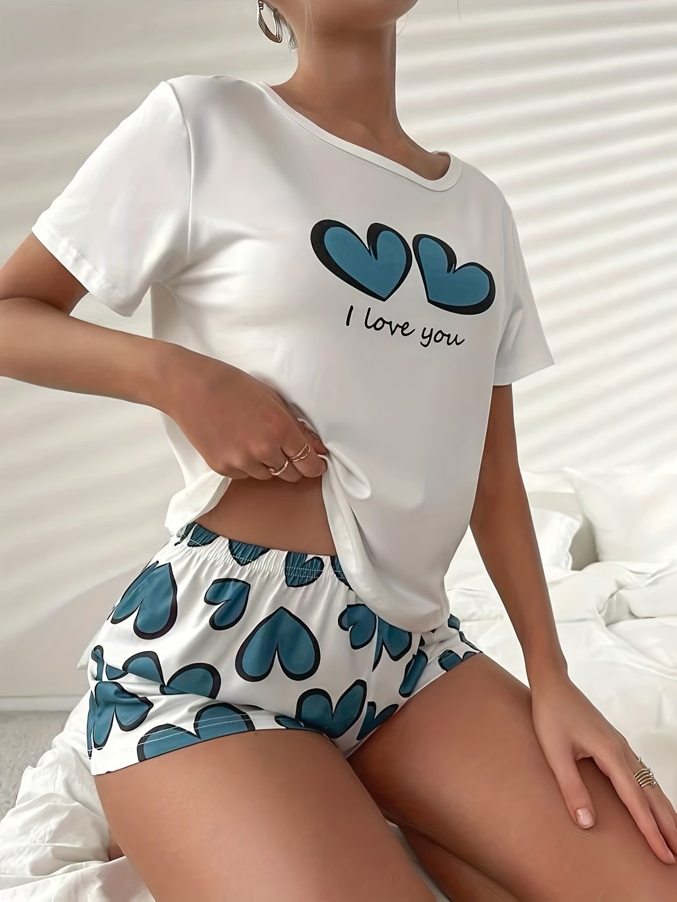 Women's Heart Print Pajama Set with Crew Neck Top and Elastic Waistband Shorts for Sleepwear and Loungewear.