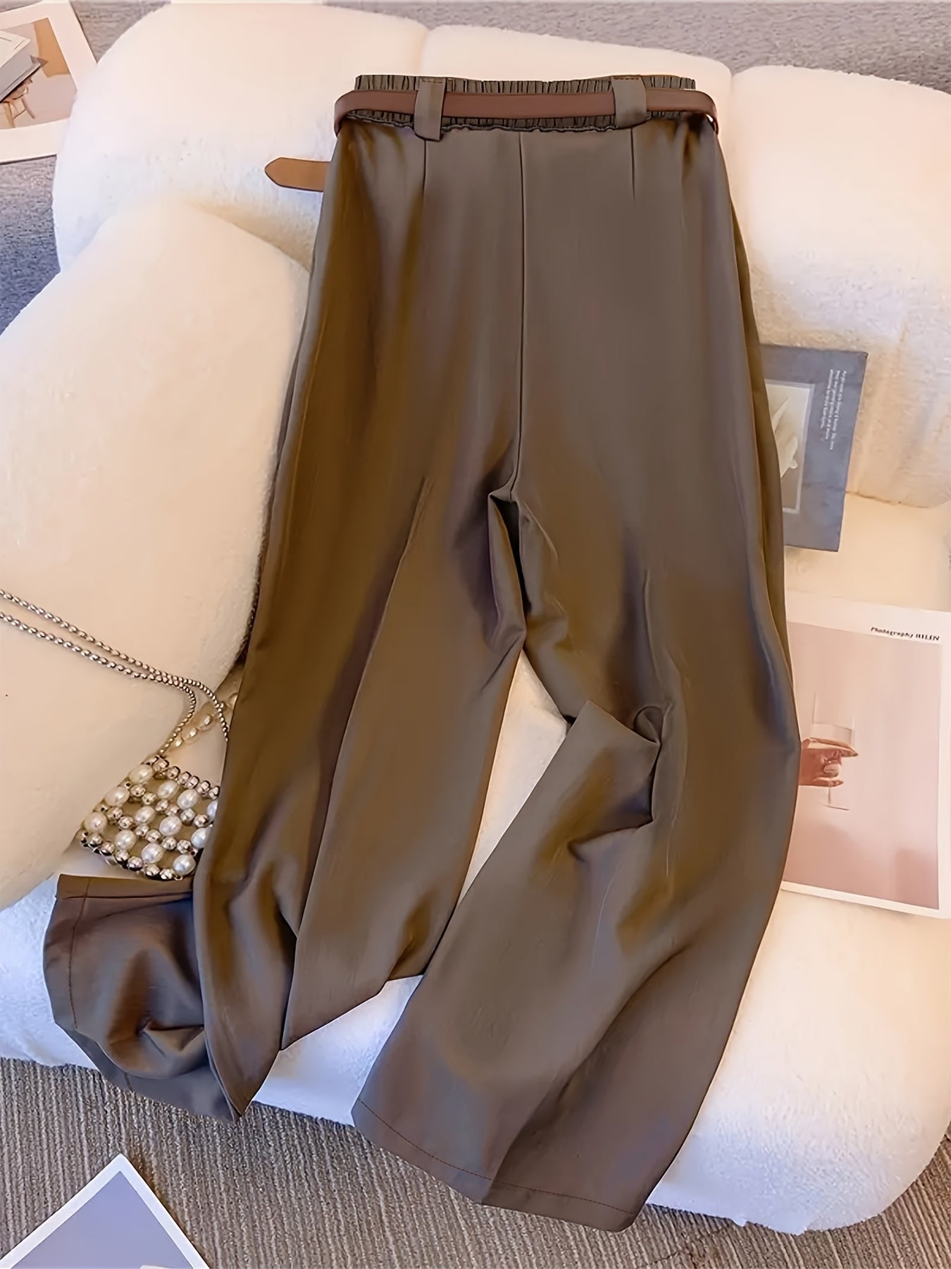 Stylish, high-waist wide-leg pants for women with zipper closure, solid color, made of polyester, machine washable. Features chic pleated design for versatile wear.