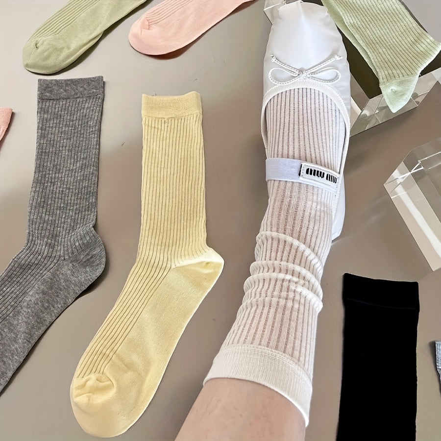 4 pairs of comfy mid-tube socks for women, with hollow out design for breathability.