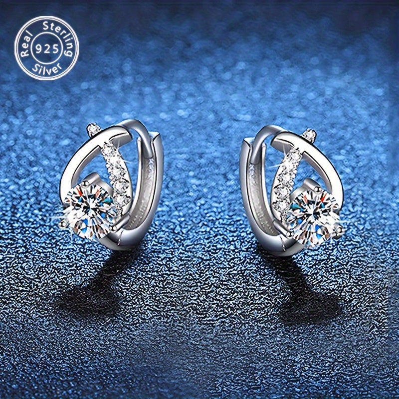 These elegant and versatile earrings feature a single 0.5 carat morganite diamond set in 925 silver. They are perfect for ladies to wear at banquets, holidays, and while commuting. These earrings make a great gift for Valentine's Day, Christmas, or a