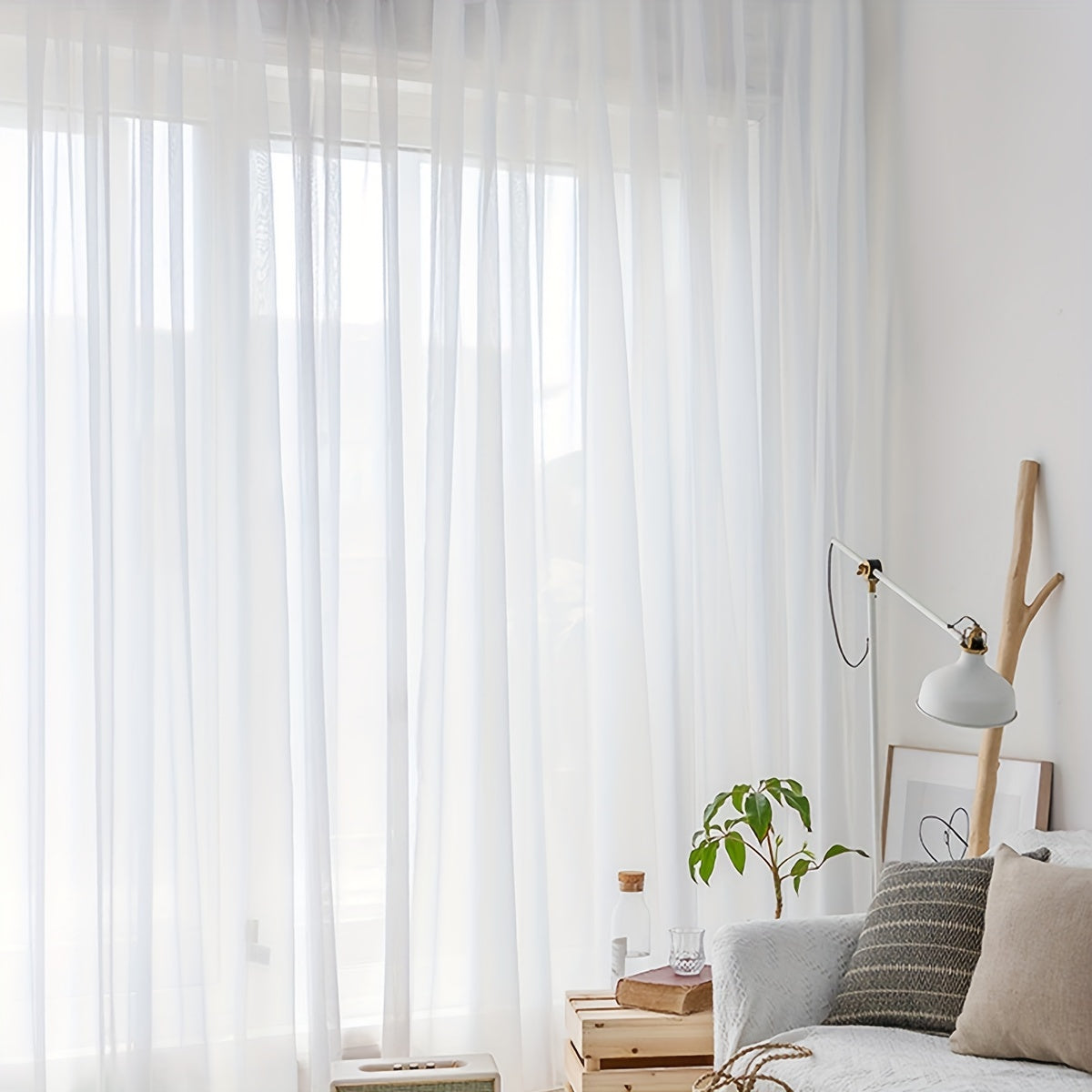 Transform your living room, bedroom, or office with this elegant sheer curtain in pure white - Lightweight and translucent with a rod pocket design, perfect for enhancing your home decor.