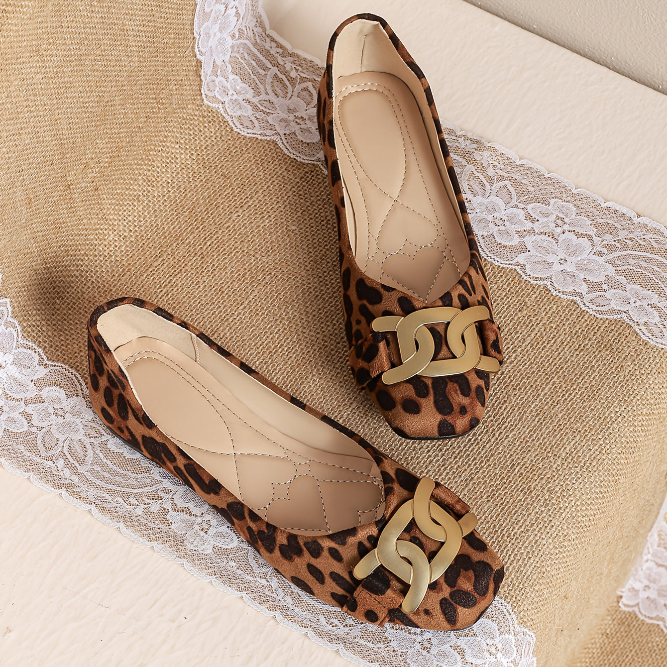 Leopard flats with buckle detail for women, versatile and comfortable slip-on shoes.