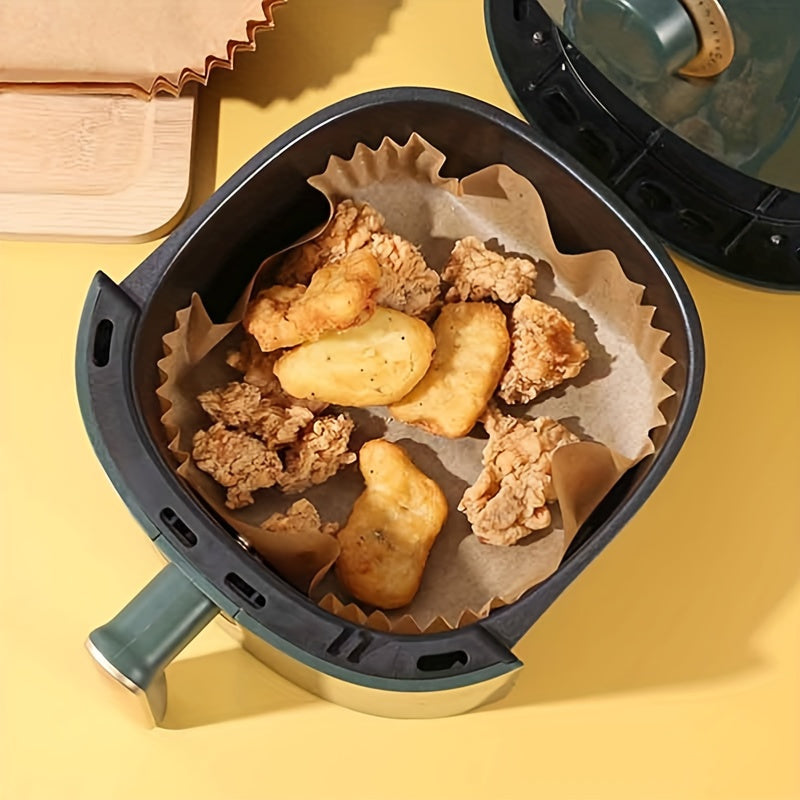 Non-Stick Disposable Air Fryer Liners available in packs of 200, 100, and 50 - perfect for use in square paper basket bowls, baking trays, and air fryer inner pots. These oven-safe kitchen accessories are essential baking tools for hassle-free cooking.