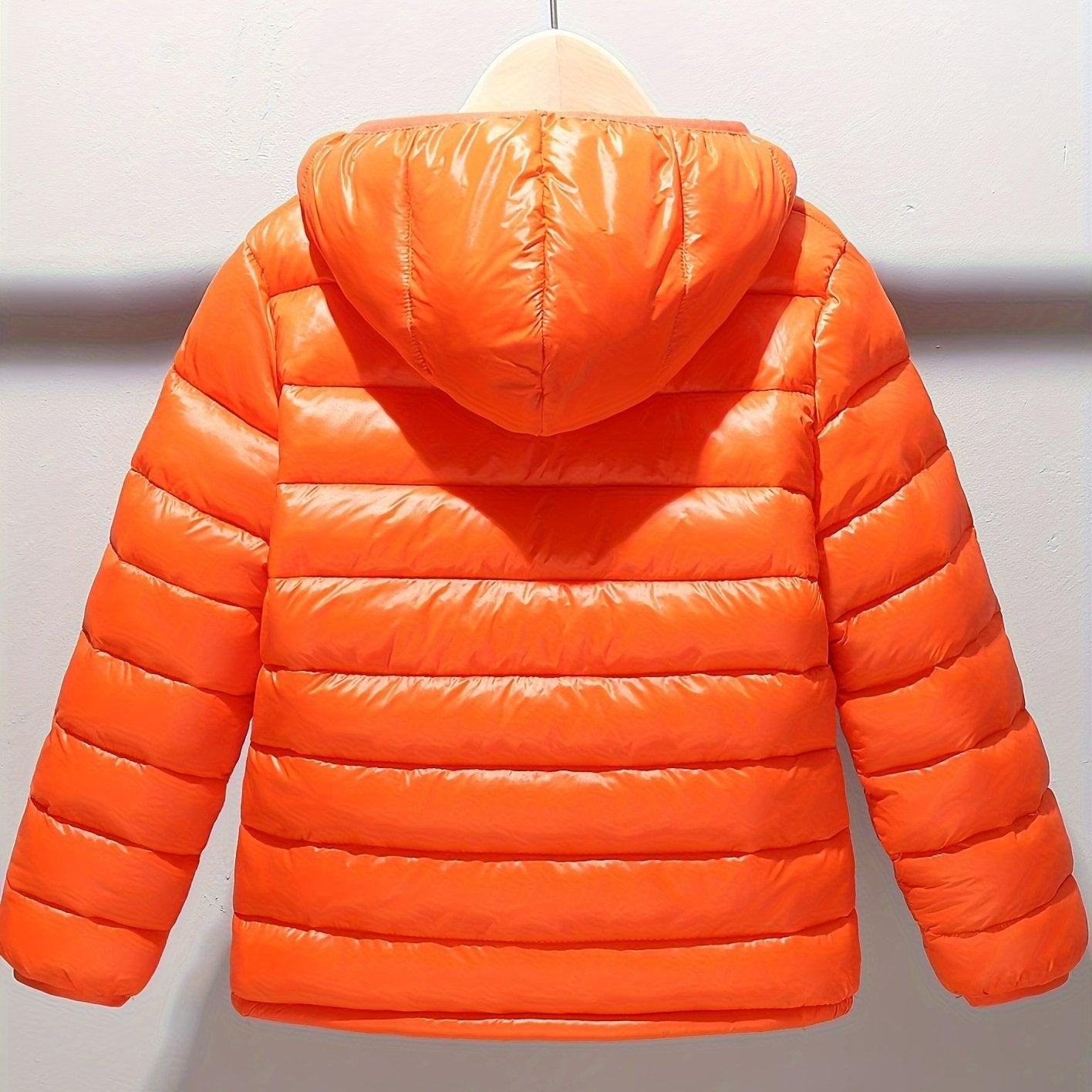 Kids' polyester puffer jacket with hood and zipper, ideal for fall/winter.