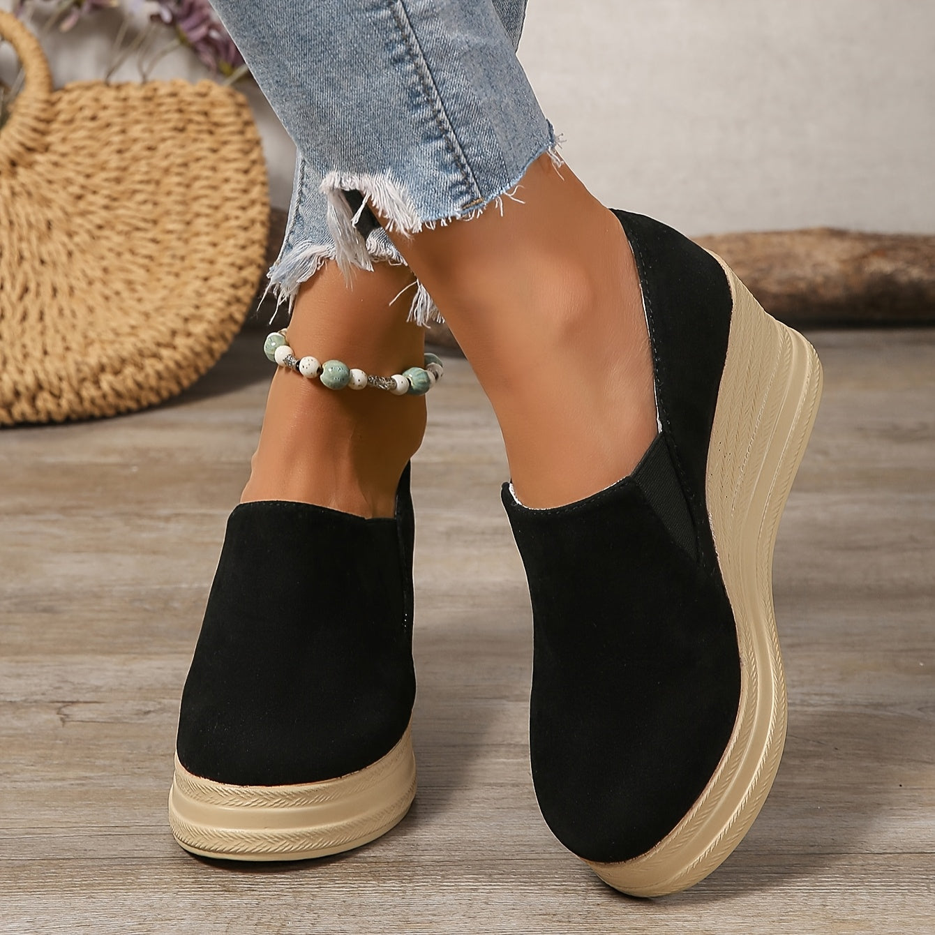 Women's platform wedge sneakers with high heels and slip-on design, featuring faux sole and fabric insole for all-season comfort.