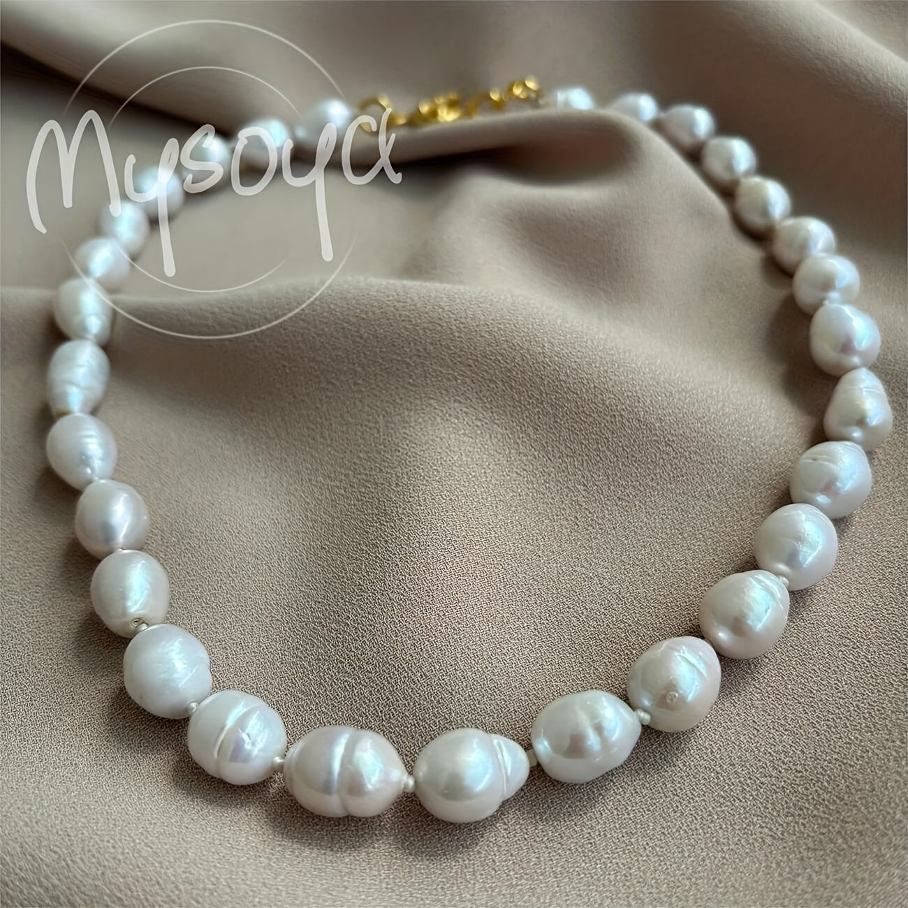 Exquisite handcrafted baroque pearl necklace featuring 10-12mm natural freshwater pearls. This stunning piece of jewelry comes beautifully packaged in a gift box, making it the perfect accessory for both daily wear and special occasions.