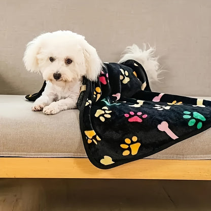 Stain-resistant fleece pet blanket with bone pattern, machine washable for dogs and cats, suitable for small to large breeds.