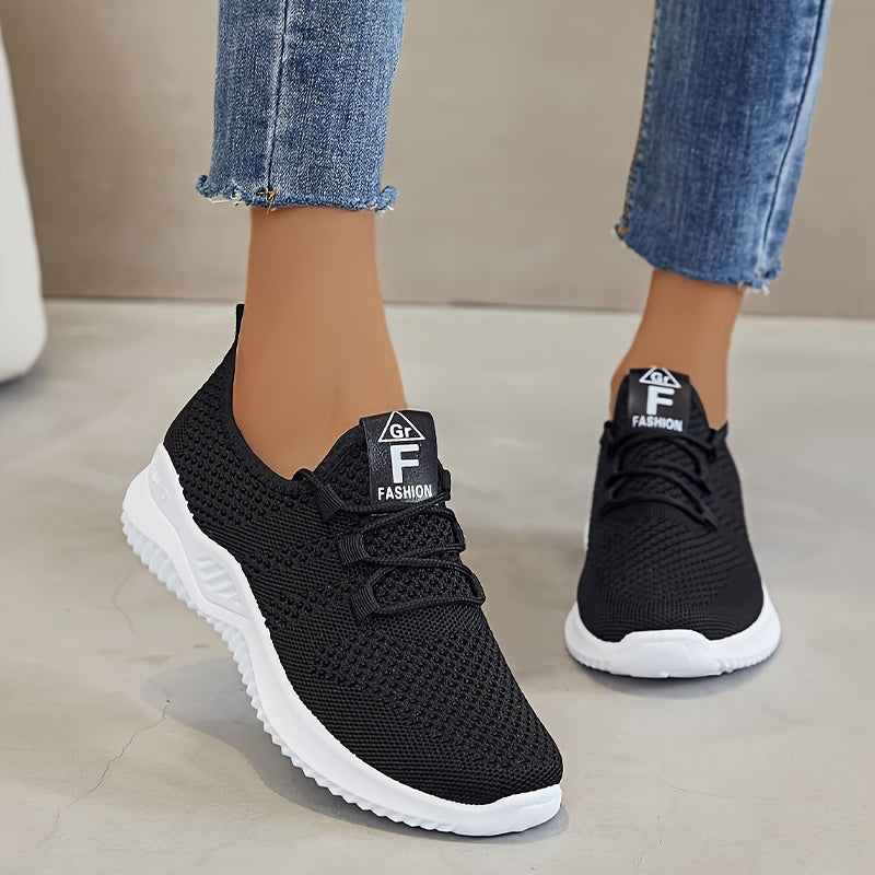 Women's comfortable low top running shoes with breathable knit fabric and thick soles for outdoor activities.