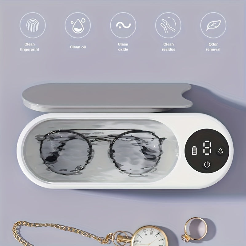 Ultrasonic cleaning machine with rechargeable lithium battery and vibrational stain removal technology for glasses, jewelry, watches, and dental retainers.