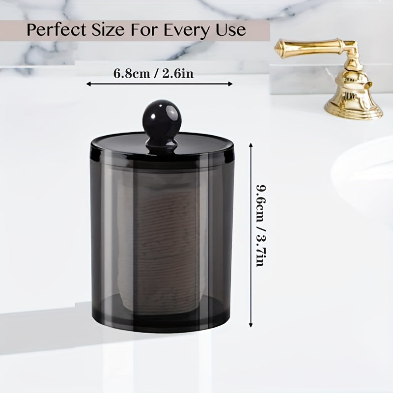 10 oz black plastic apothecary jar for bathroom storage of cotton balls, swabs, rounds, floss picks, hair clips, and ties.