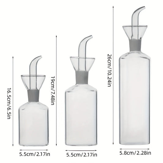 Transparent oil dispenser available in 5oz, 6.7oz, and 15.2oz sizes. This leakproof glass bottle is perfect for storing olive oil, vinegar, and other liquid seasonings. Suitable for cooking, baking, salad, and grilling. A must-have in your kitchen