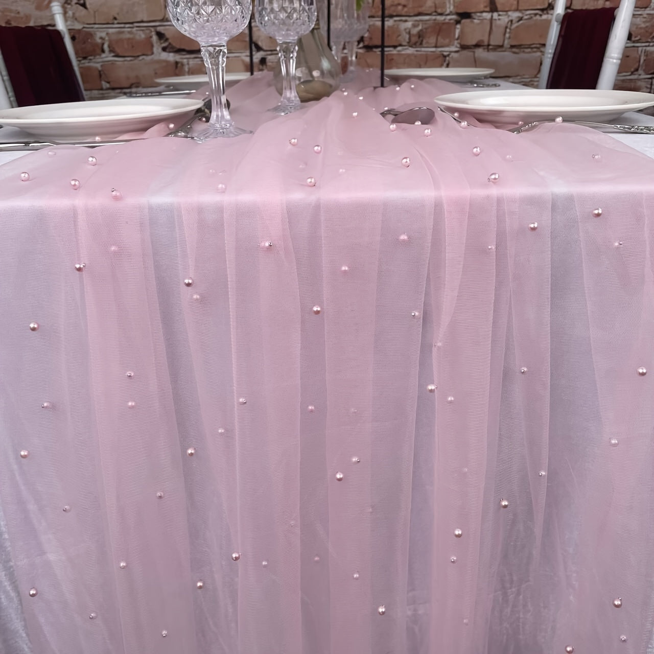 Wedding veil lace table runner with beaded pearls and soft tulle for table decor at weddings, parties, and holidays.