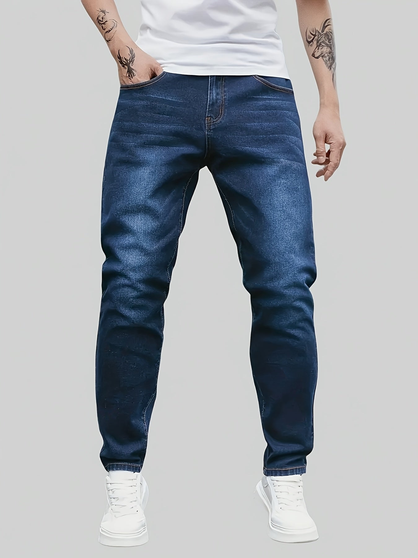 Men's denim jeans in plus size with a straight leg cut, made of 65% cotton, 33.7% polyester, and 1.3% spandex. Features medium stretch, all-season comfort, solid washed style, and 370gsm