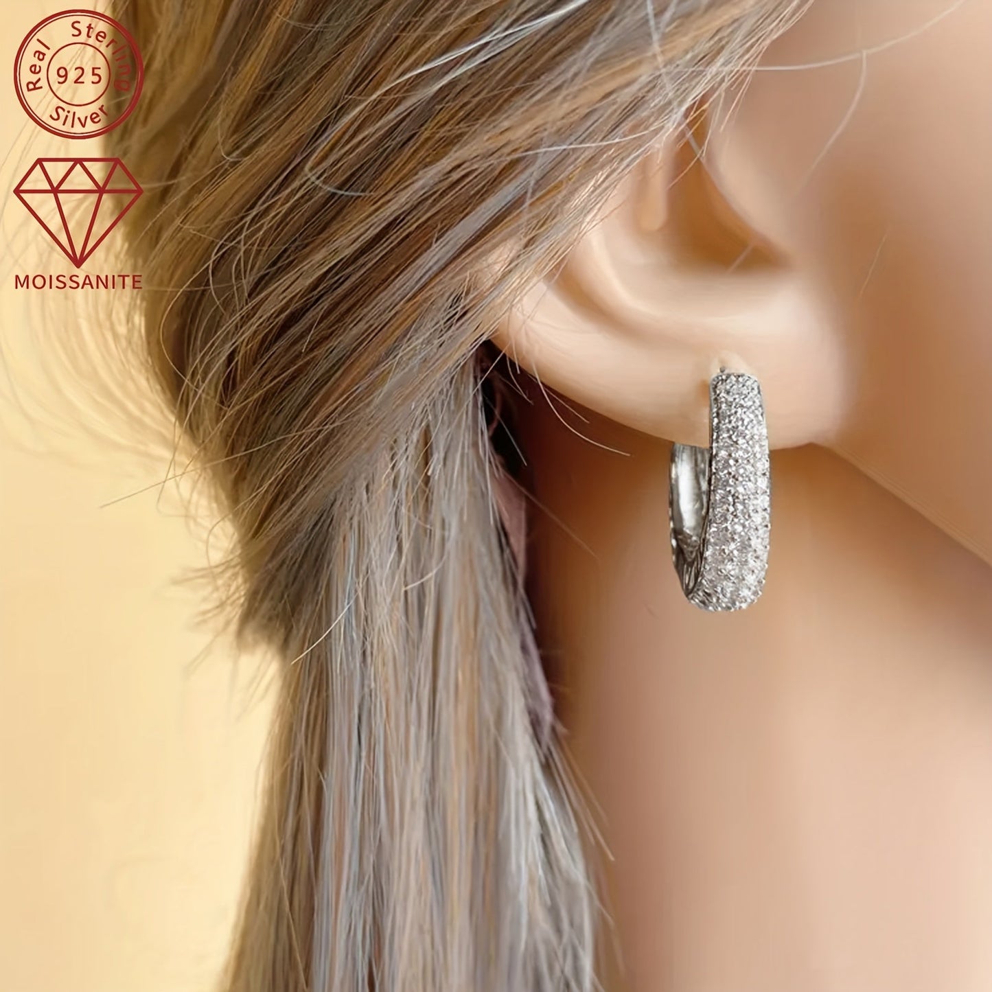 These exquisite women's fashion earrings are made entirely of Moissanite and weigh 8.03g. They feature a stunning pattern of 1.4mm, 1.2mm, 1mm, and 0.8mm Moissanite stones, as well as two 0.43ct Moissanite stones. Crafted in 925 silver, this pair of