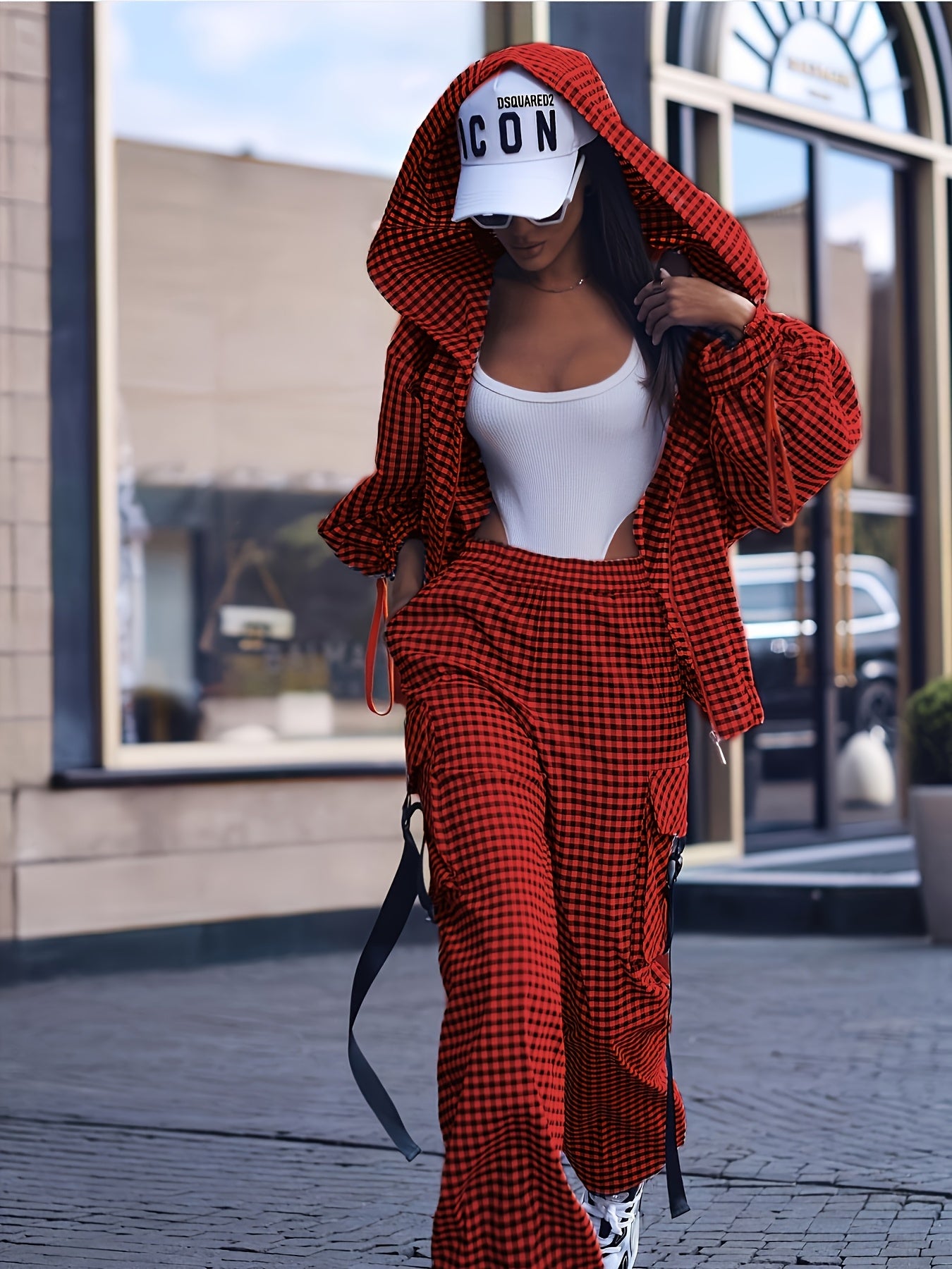 Casual gingham pantsuit for women, with lapel collar and zipper details, made of 100% polyester woven fabric, ideal for fall/winter.