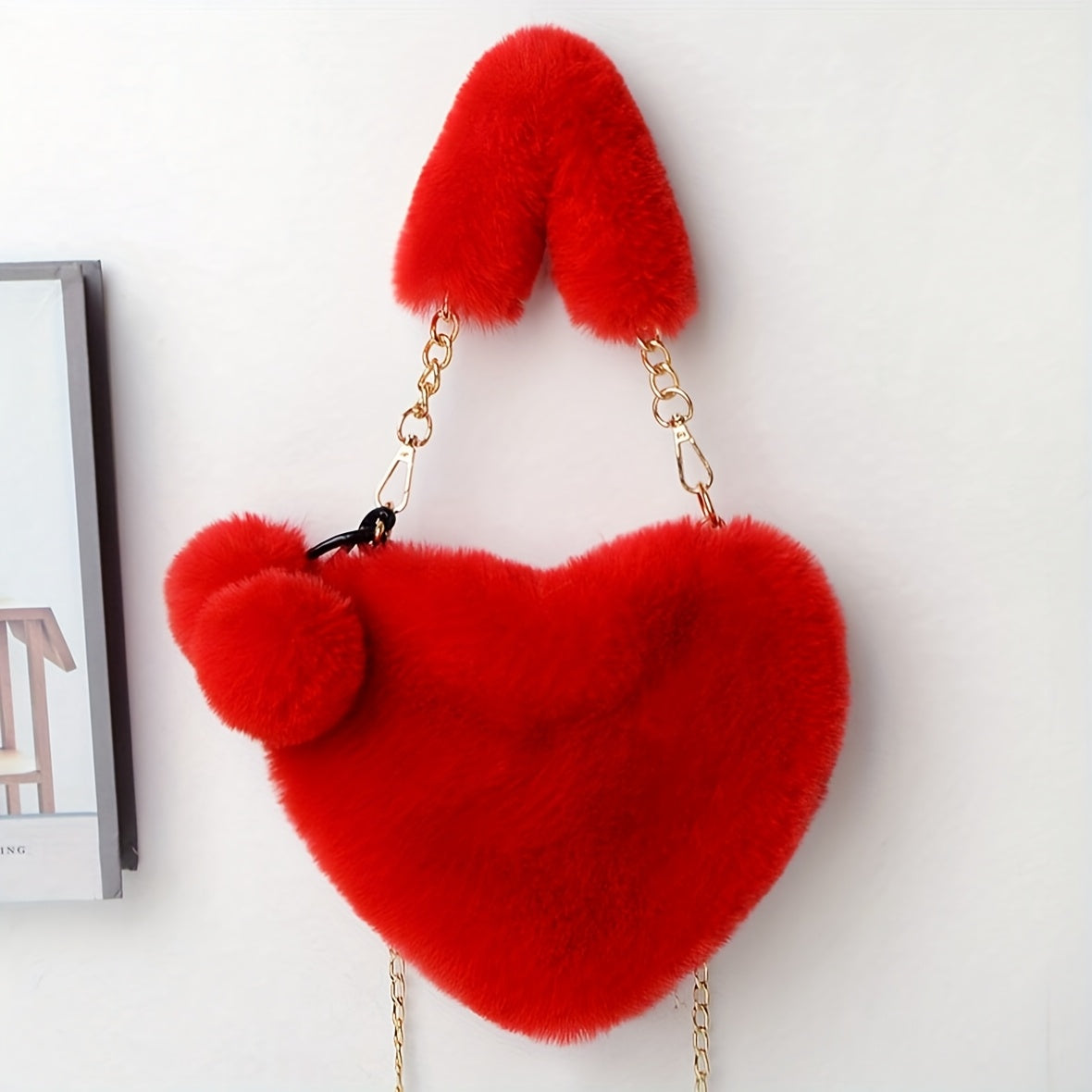 Elegant plush heart-shaped shoulder bag with zipper closure and detachable strap, ideal for Valentine's Day gift. Comes in khaki/white/red/black.