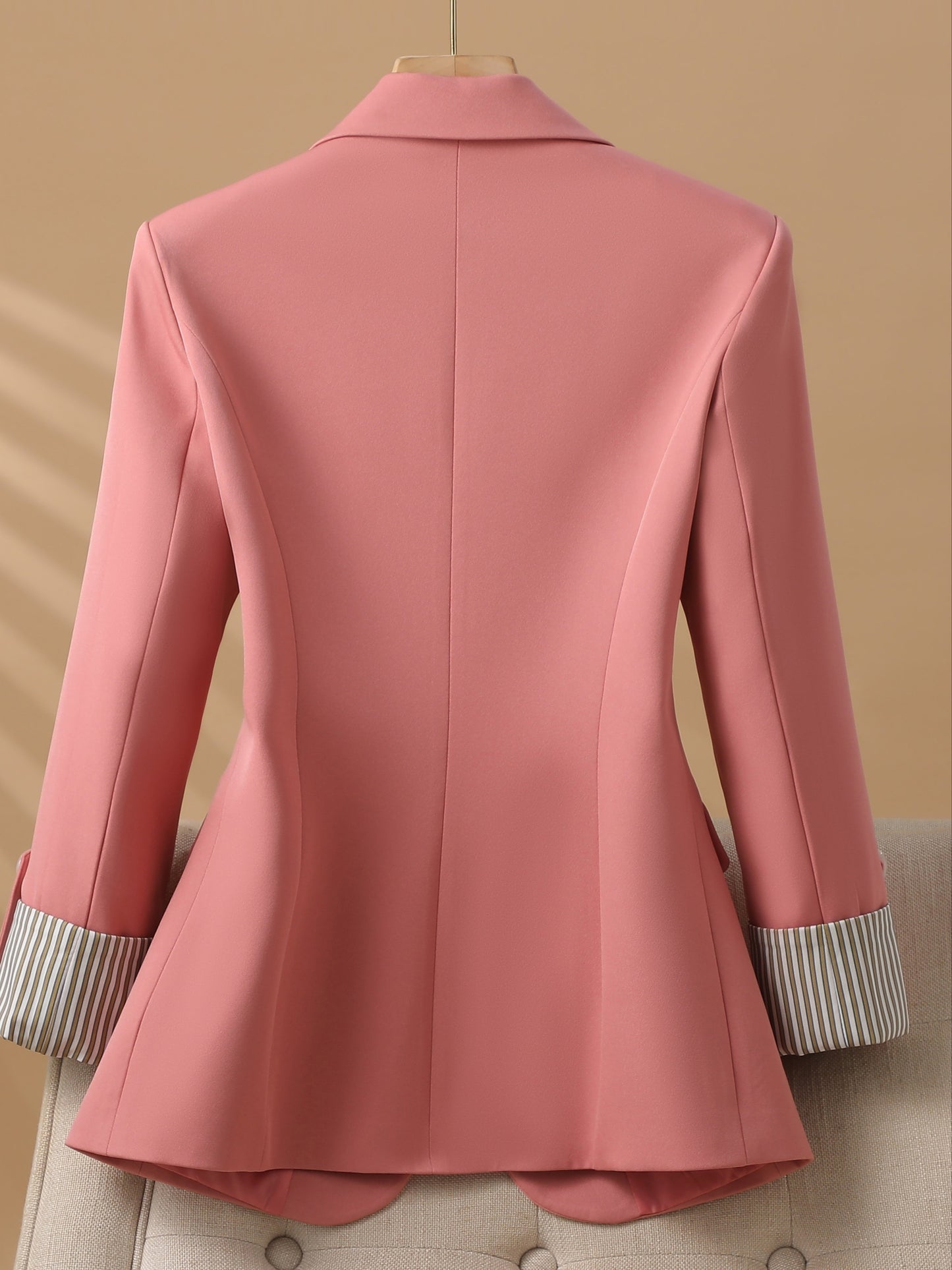 Stylish roll-up sleeve blazer for women, solid color with pockets, machine washable, ideal for fall & winter.