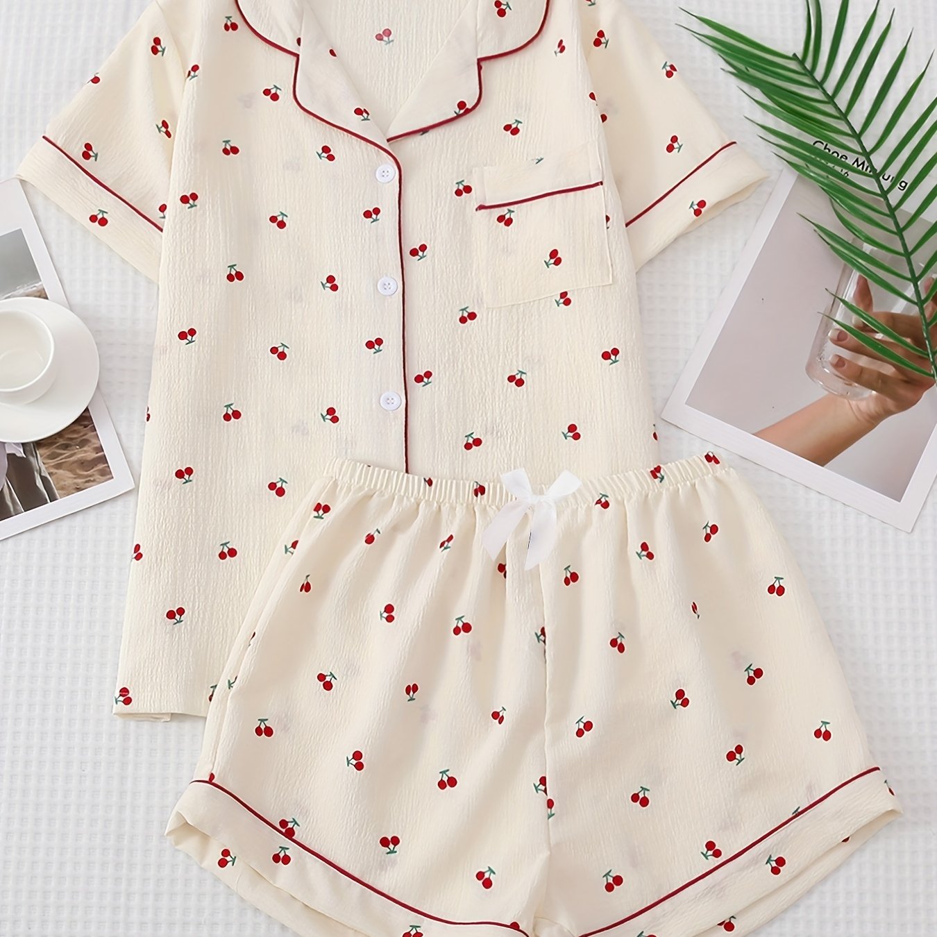 Cherry print pajama set featuring lapel button top and bow shorts, perfect for women's sleepwear and loungewear.