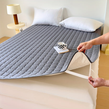 Waterproof mattress topper with machine washable quilted polyester cover, polyurethane liner, and non-slip design for dormitory and home use. 1-piece.