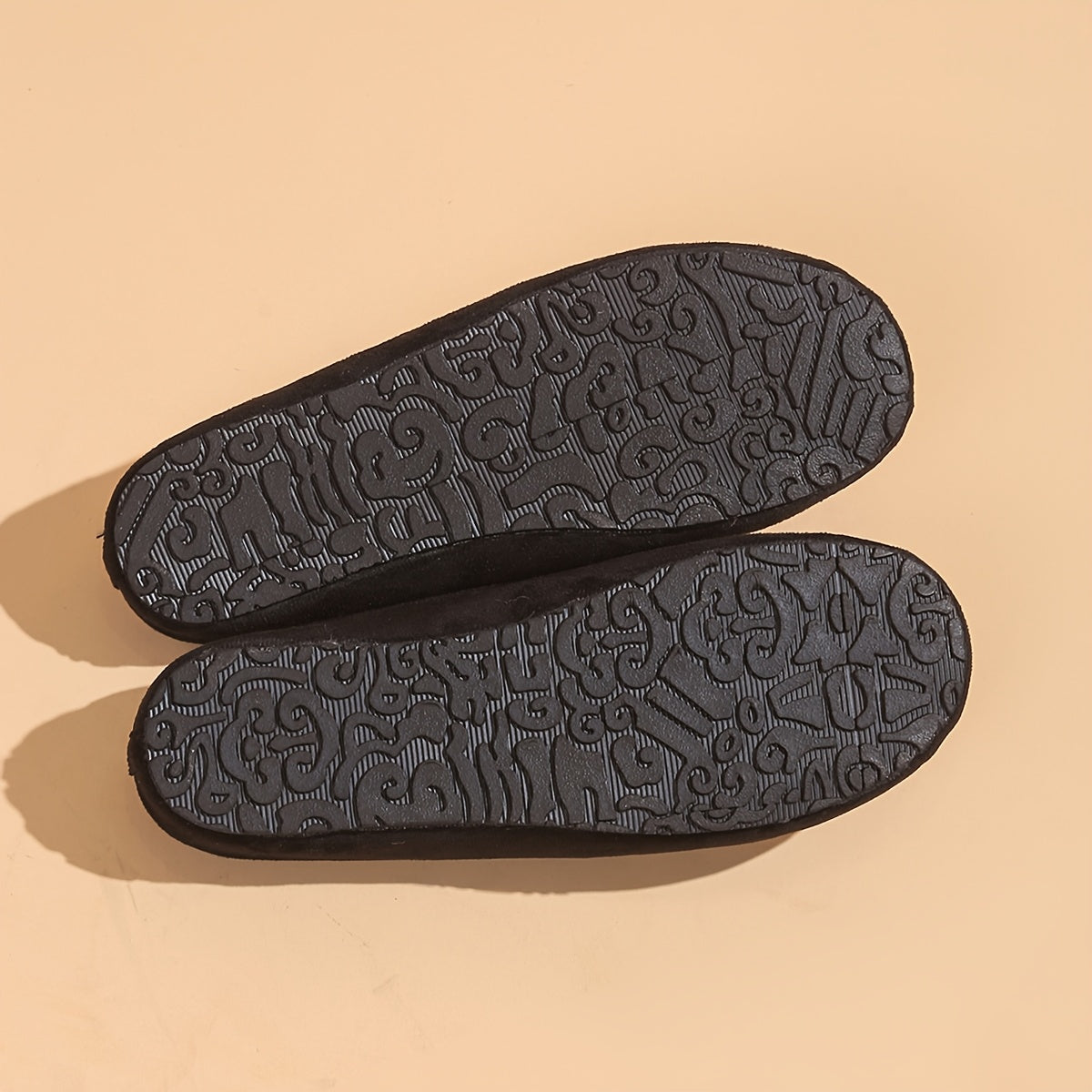 Stylish black embroidered floral mules with soft rubber sole and faux cover lining for comfortable year-round wear.