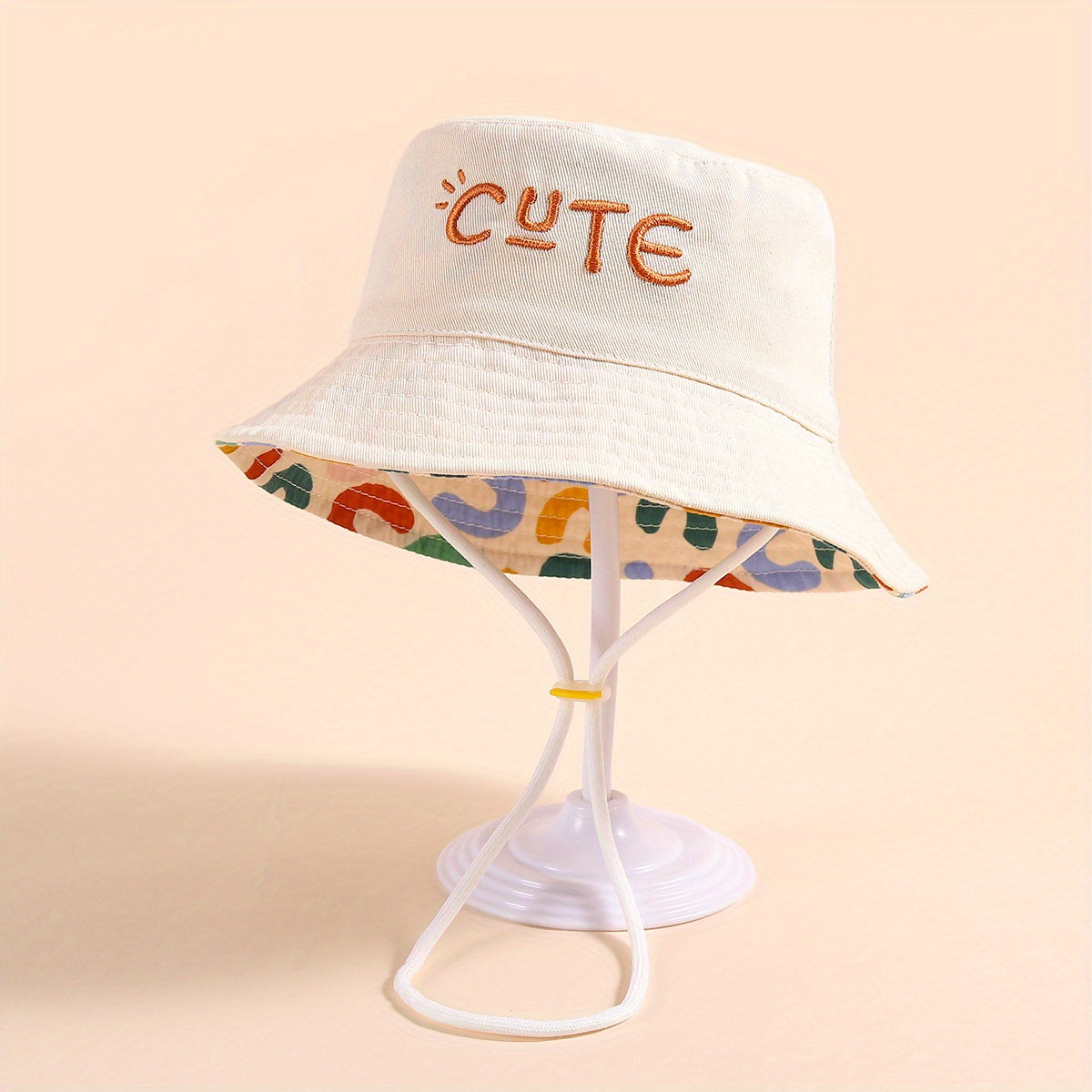 Stylish fisherman hat with cute letter embroidery, wide brim and drawstrings for sun protection and outdoor activities. Ideal for boys and girls in beach parties or traveling.