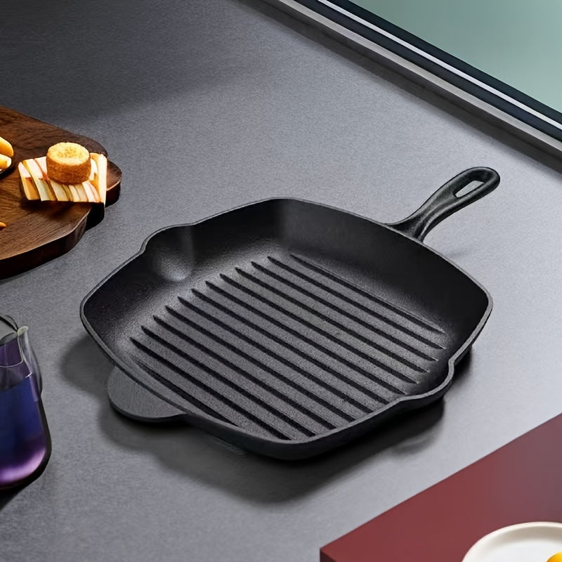 This new large steak frying pan is made of thickened cast iron, making it perfect for use in a new home. It can also be used for frying fish and features a special design that makes it compatible with both gas and electric stoves. The pan has a flat