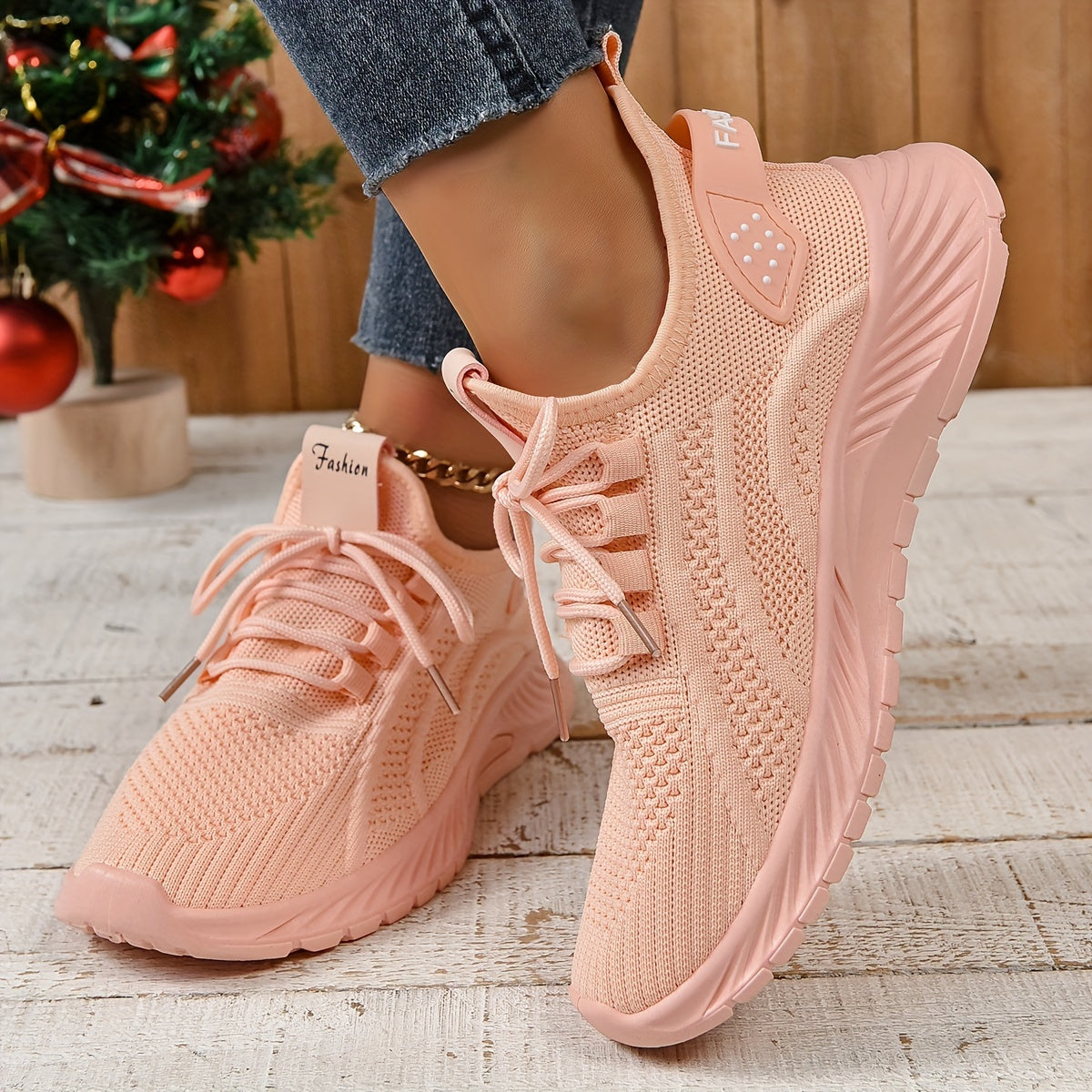 Trendy white knit fabric sneakers for women with EVA sole and breathable lace-up design, suitable for all seasons. Lightweight and stylish.