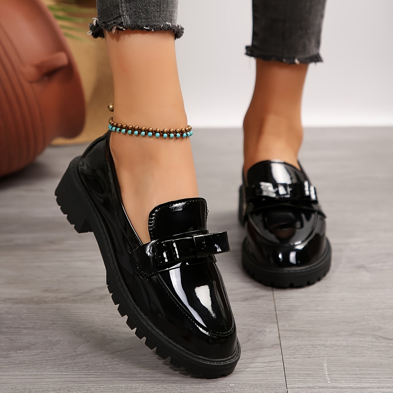 Black faux leather loafers for women with bow detail - comfortable slip-on dress shoes for spring and autumn, perfect for casual or office wear.