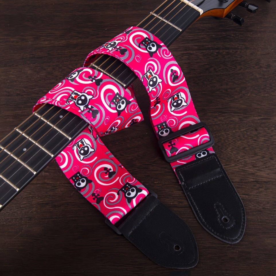 Durable, adjustable faux leather guitar strap in vibrant pink, yellow, and black patterns, suitable for acoustic, electric, and bass guitars.