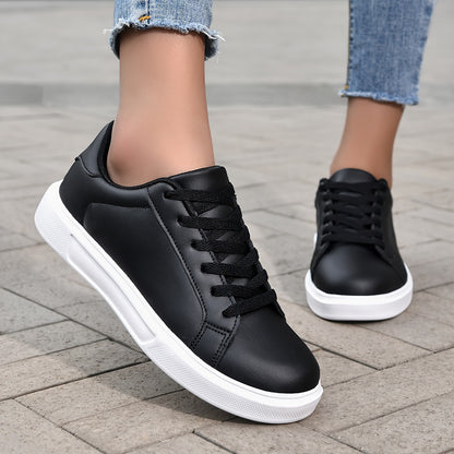 Black lace-up sneakers for women, versatile and comfortable for outdoor activities.