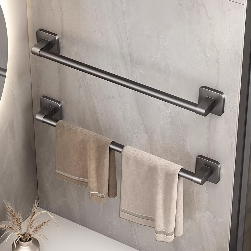 Wall-mounted towel rack for bathroom made of durable space aluminum and plastic. Easy installation with no drilling required. Single rod design for organizing towels.