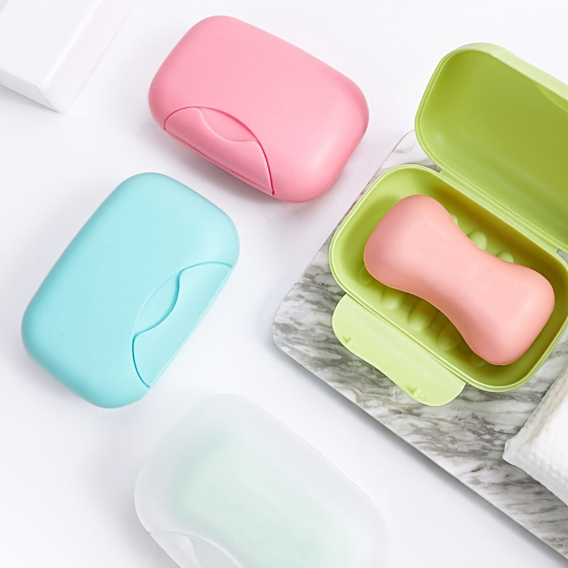 Plastic soap box with lid for travel, camping, or gym use. Waterproof and portable. Perfect for storing soap on the go.