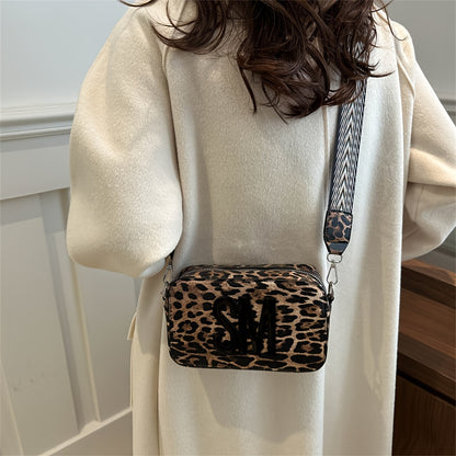 Leopard print PU crossbody bag with detachable strap in deep brown, perfect for casual or commuting outfits. Bold letter design on small shoulder bag.