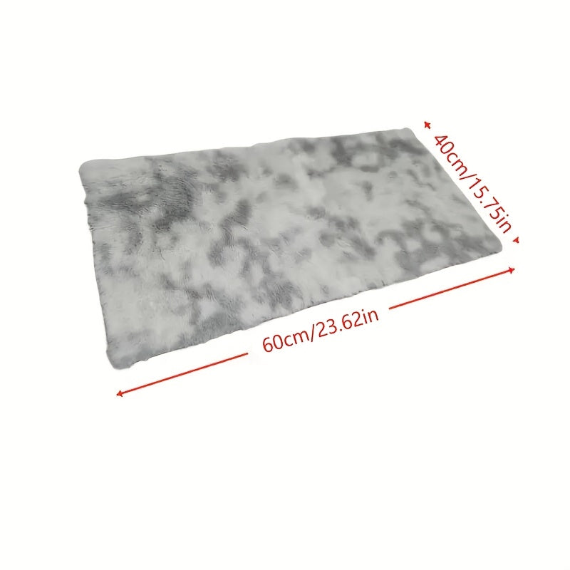 A stylish light grey tie-dye gradient plush carpet perfect for your living room, coffee table, or bedside. This long-haired washable mat is ideal for adding a touch of Nordic style to your bedroom.