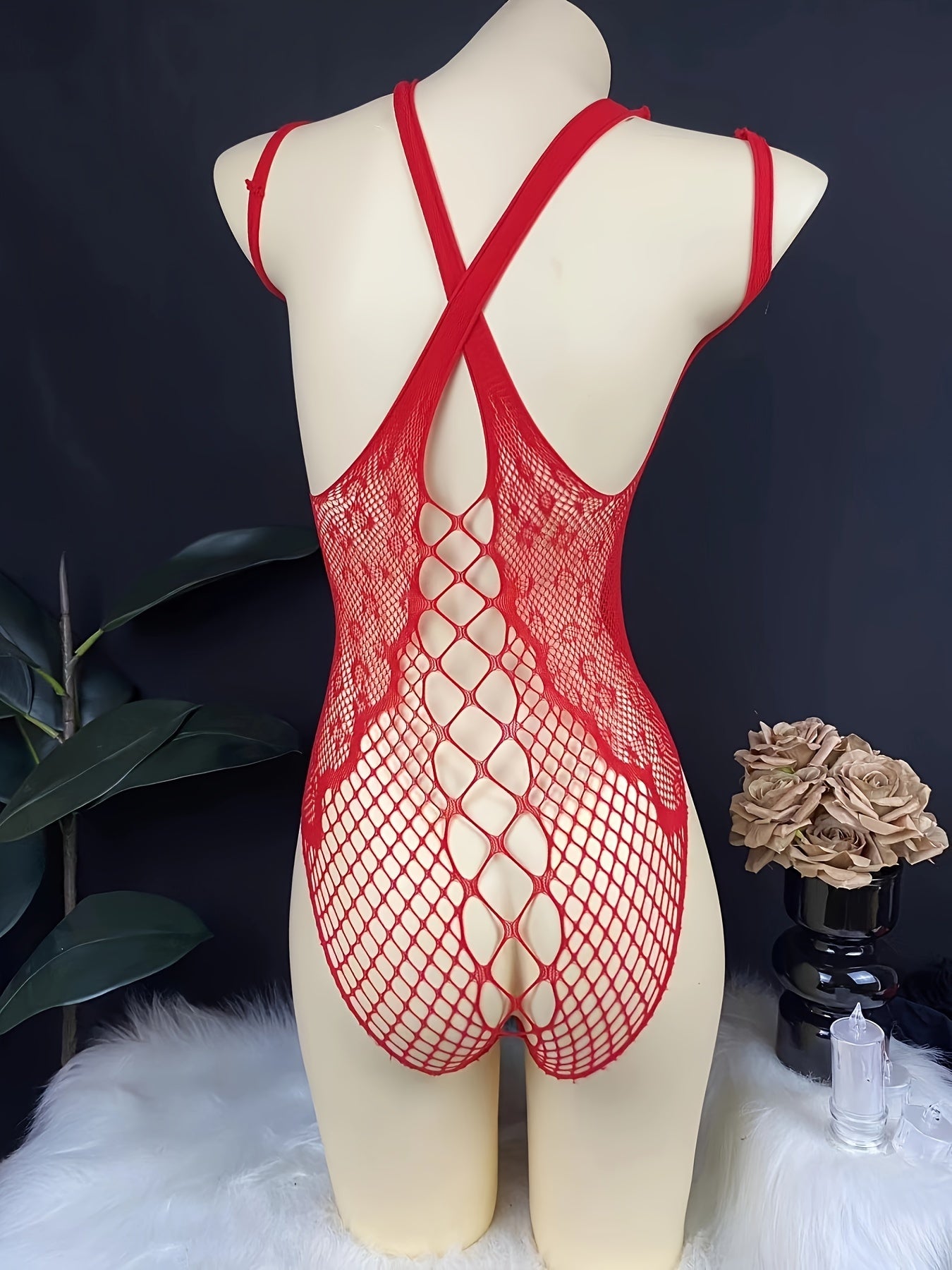 Red lace mesh bodysuit for women with hollow-out design, made of nylon. Features a tight and cropped style in knitted fabric.