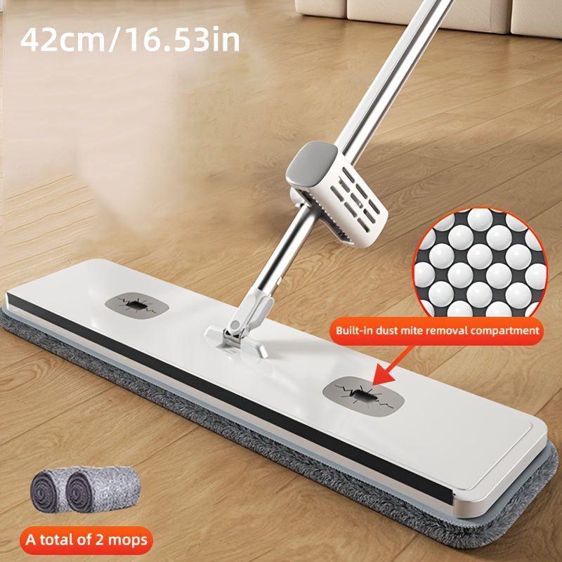 The Hands-Free Wash Flat Mop Set is a versatile cleaning tool with 2 reusable pads. It has a durable, long handle that makes it easy to clean tile, hardwood floors, and more. Ideal for use in the kitchen, bathroom, and living room.