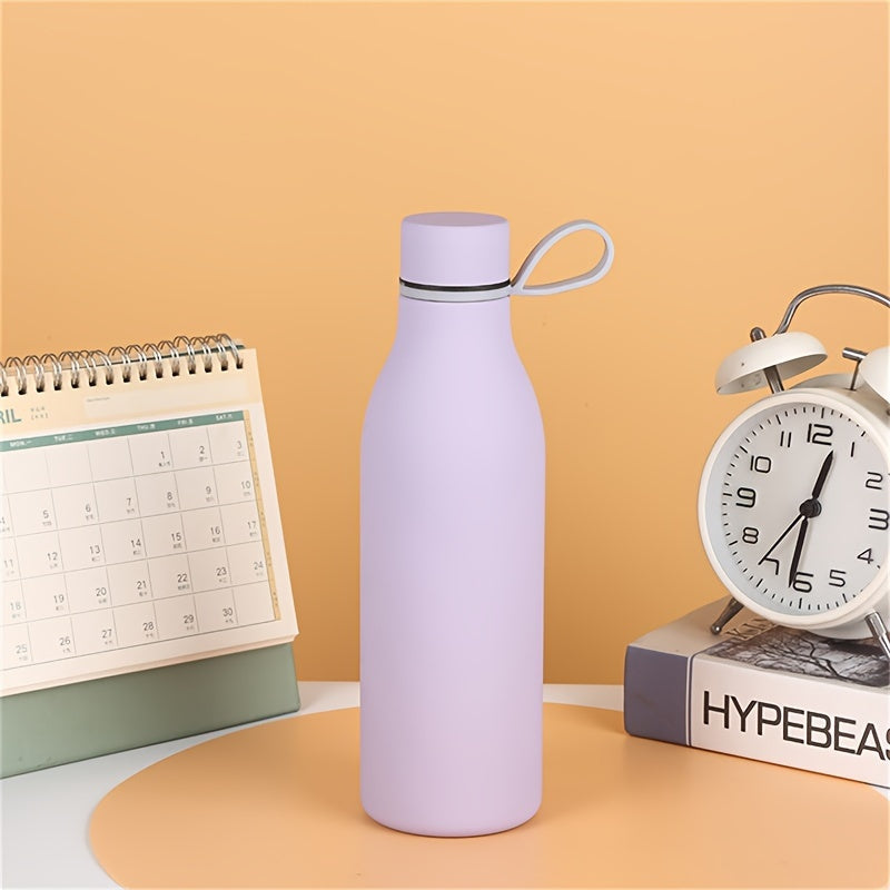 Stainless steel vacuum insulated water bottle with carrying handle, leak-proof design, and 500ml capacity, perfect for outdoor activities and gifts.