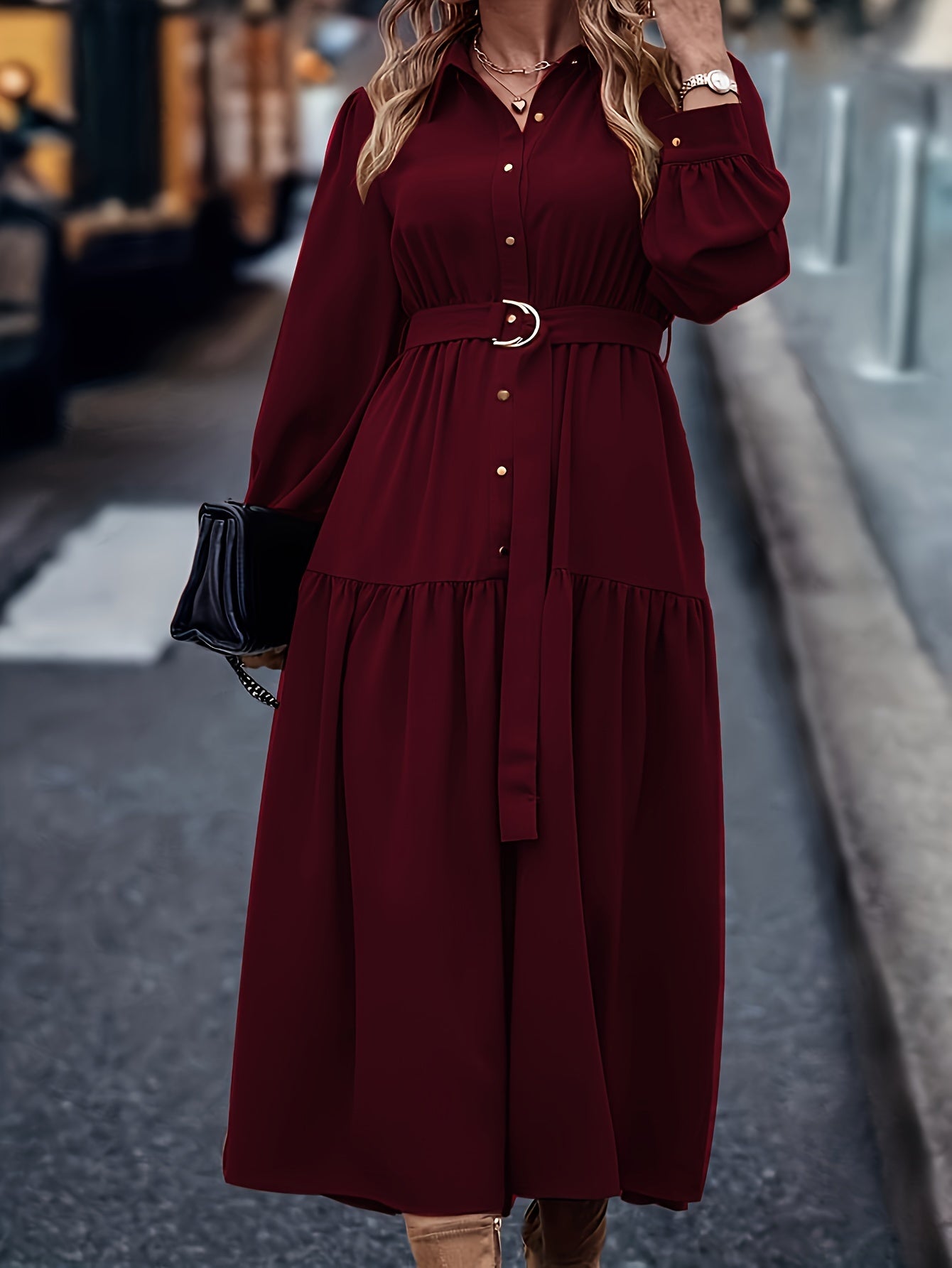 Middle-Eastern style polyester shirt dress with lantern sleeves, ruffled hem, and button details - A-line woven midi dress suitable for spring/fall.