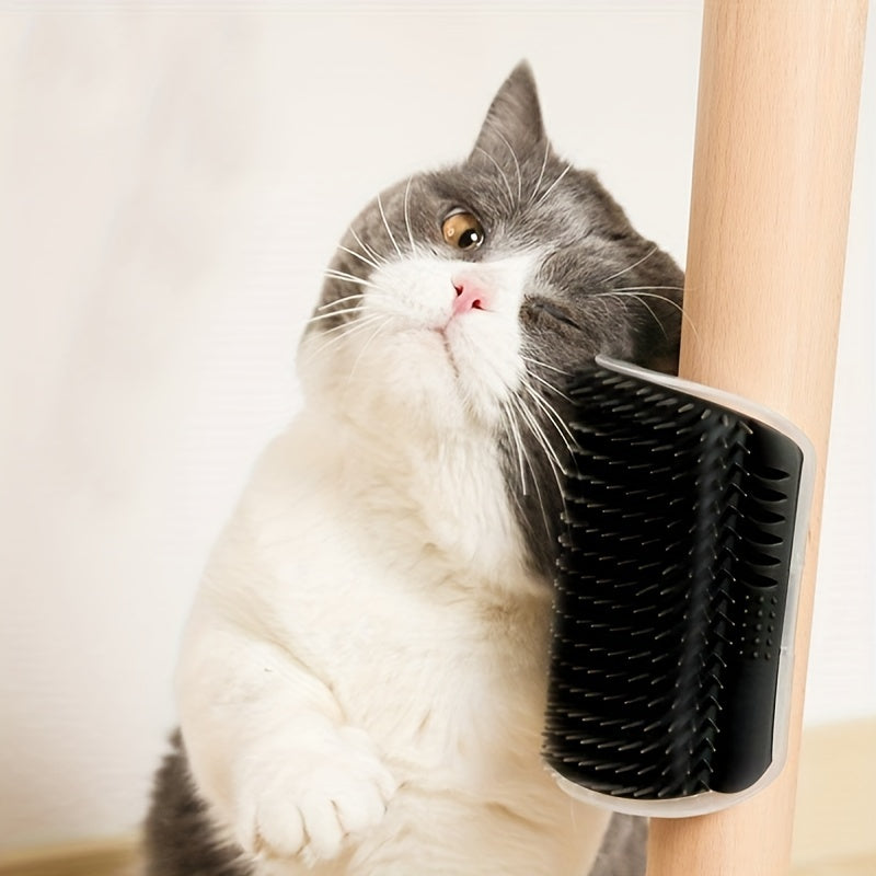 Wall-mounted self-groomer with massage comb for kittens and puppies.