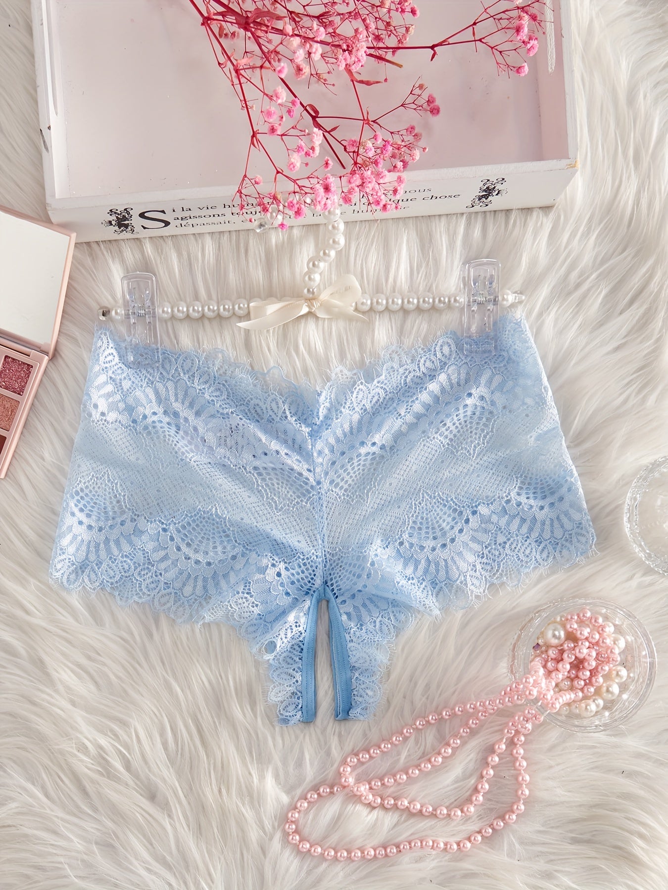 Low waist lace panties with charming design, for women seeking sexy and erotic intimates.