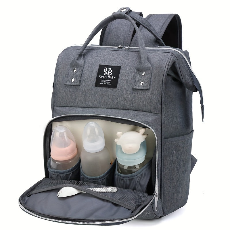 Large waterproof grey mommy backpack with bottle warmer, utility pockets, and soft shell for casual use.